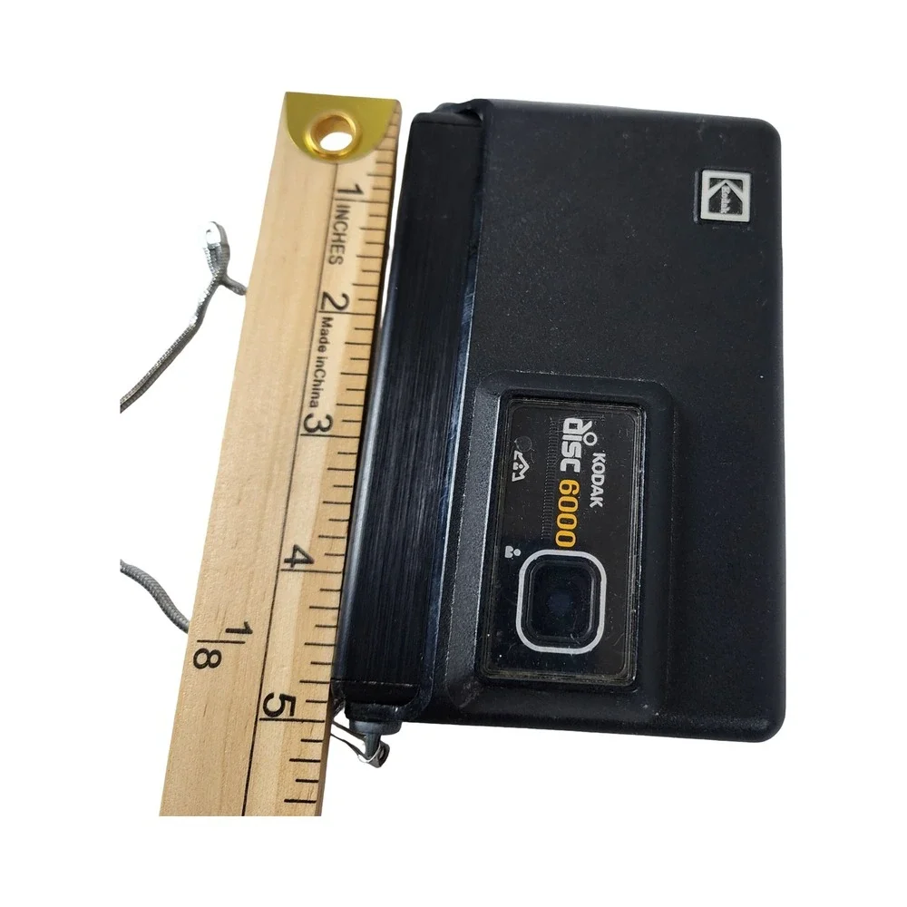 Kodak Disc 6000 Vintage Film Camera Black with Wrist Strap and Film Cartridge‎